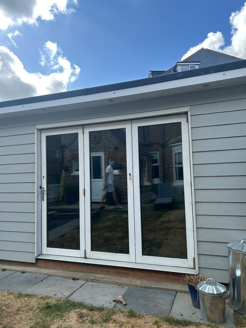 AV Steel 35 solar and privacy window film on summer house bi-fold doors in Bexhill by Southpoint Window Films