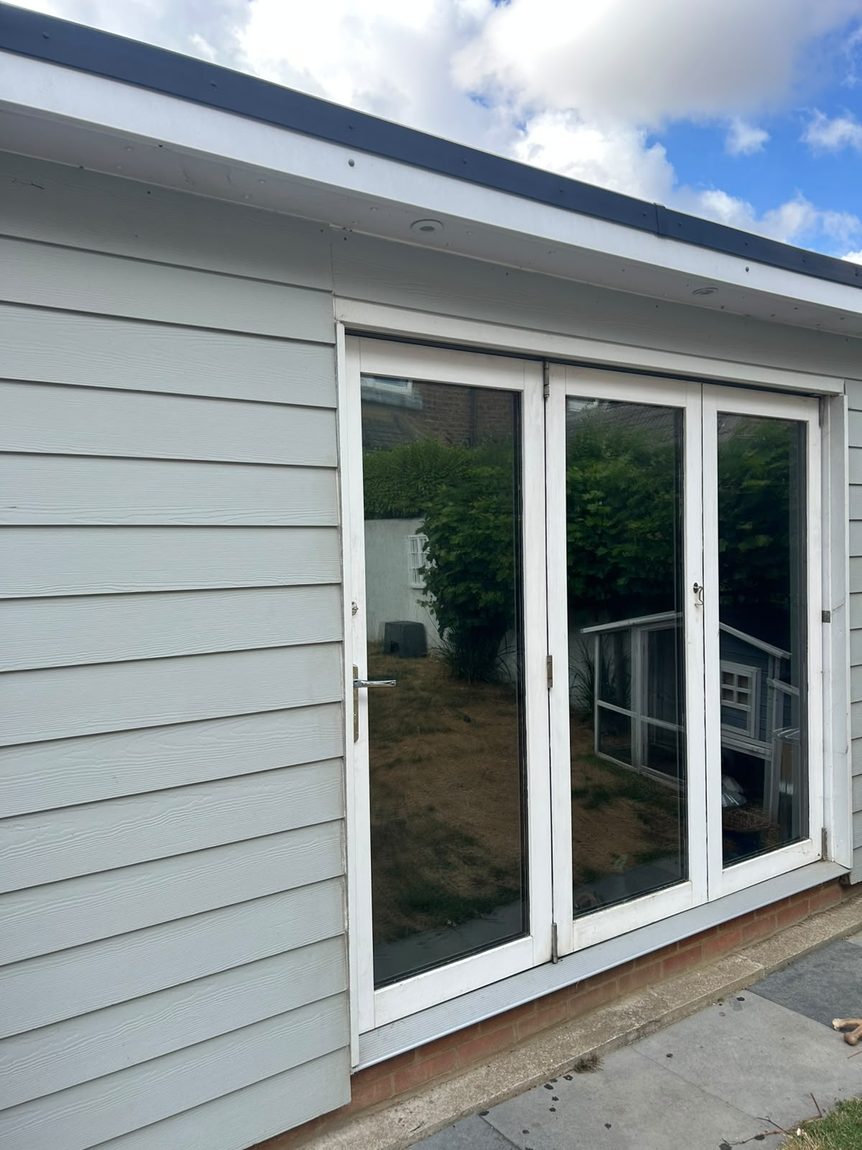 AV Steel 35 solar and privacy window film on summer house bi-fold doors in Bexhill by Southpoint Window Films