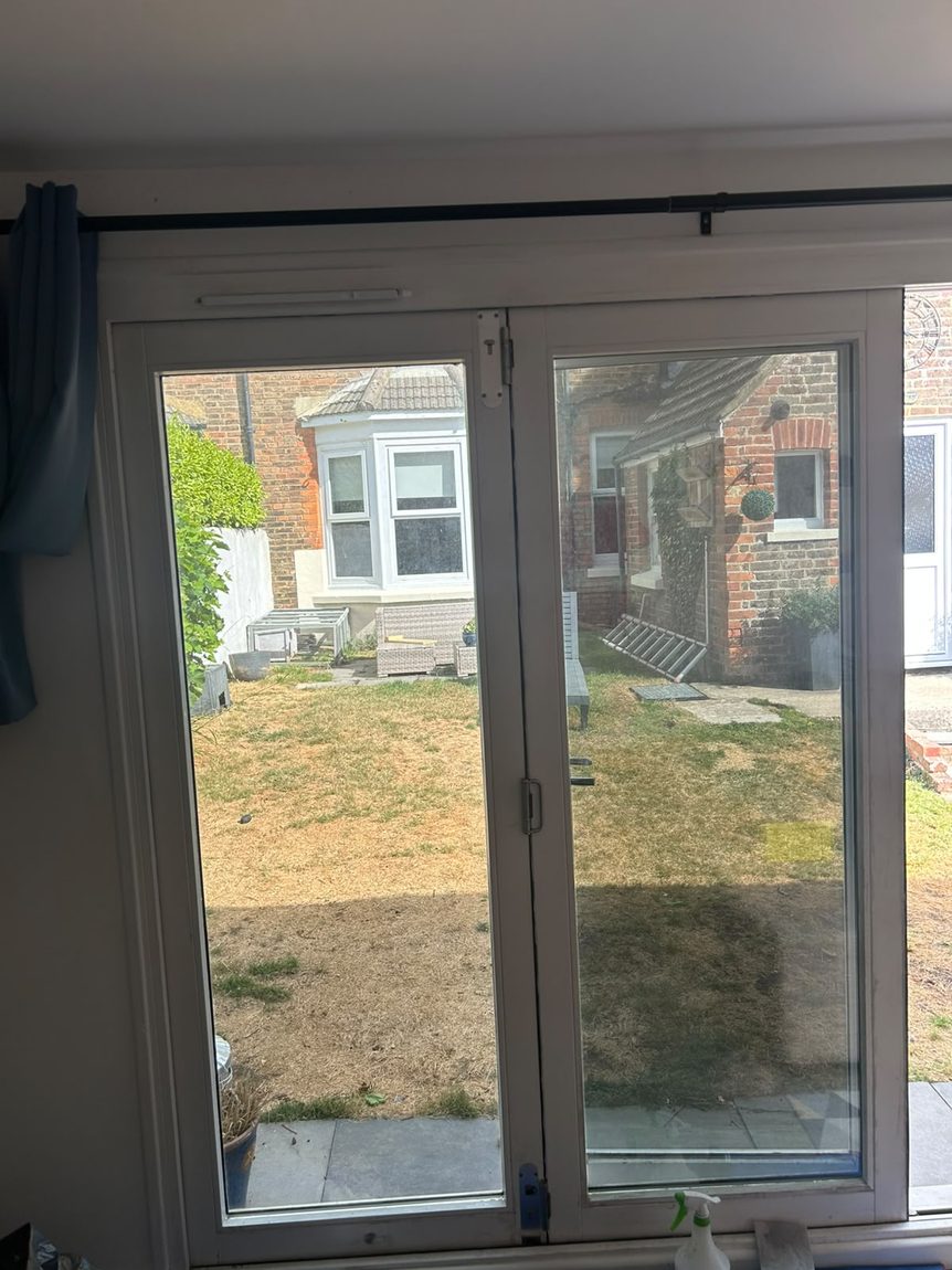 AV Steel 35 solar and privacy window film on summer house bi-fold doors in Bexhill by Southpoint Window Films