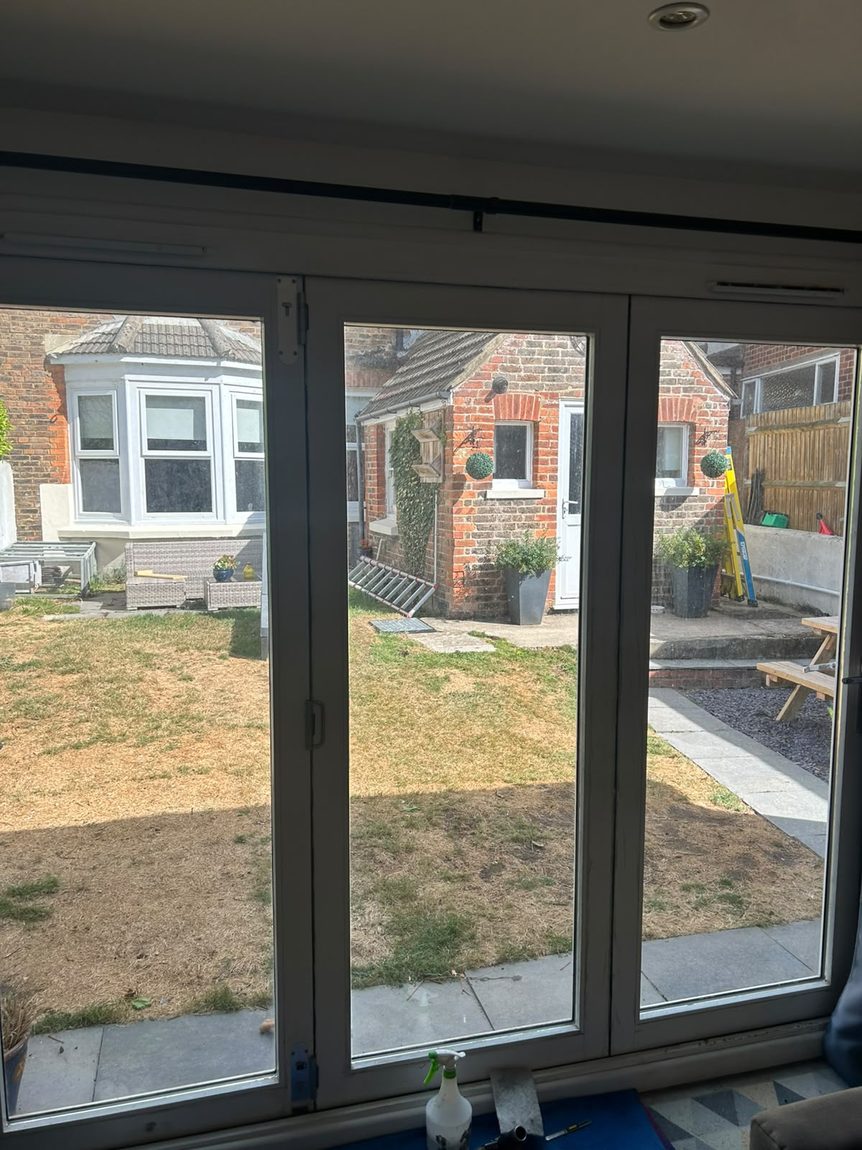 AV Steel 35 solar and privacy window film on summer house bi-fold doors in Bexhill by Southpoint Window Films